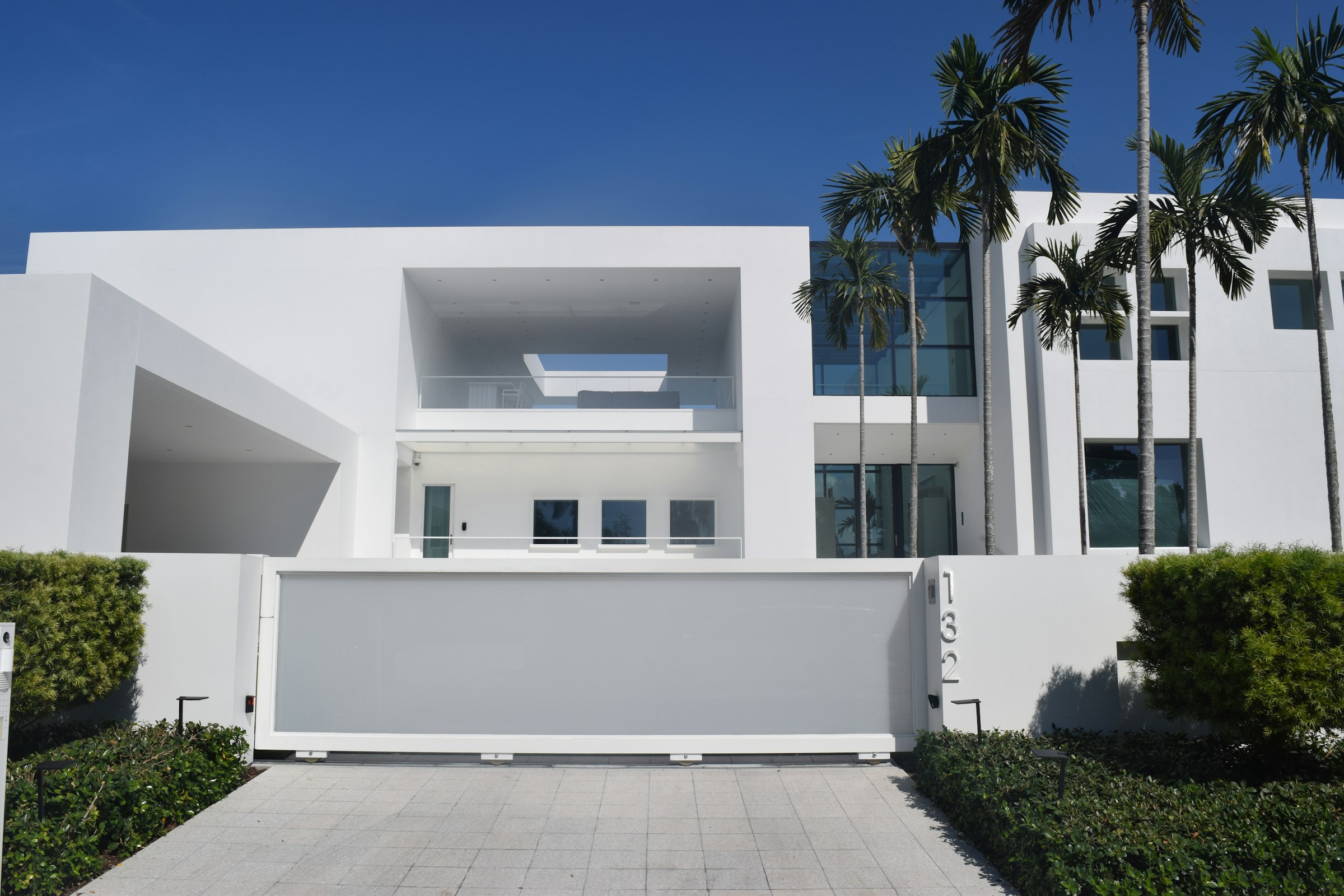 Crisp modern Florida architecture framed by palms